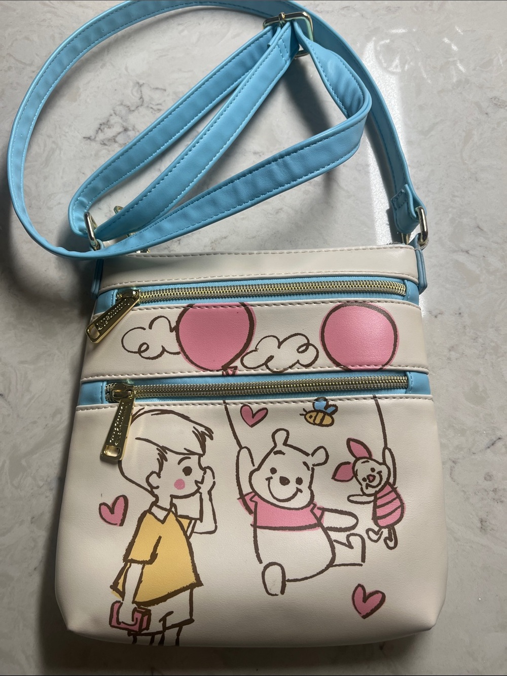 Loungefly Cream Crossbody Bag with Light Blue Trim and Pink Accents